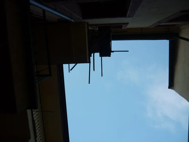 European courtyard looking up — essay on Paris and James Baldwin by David Moran
